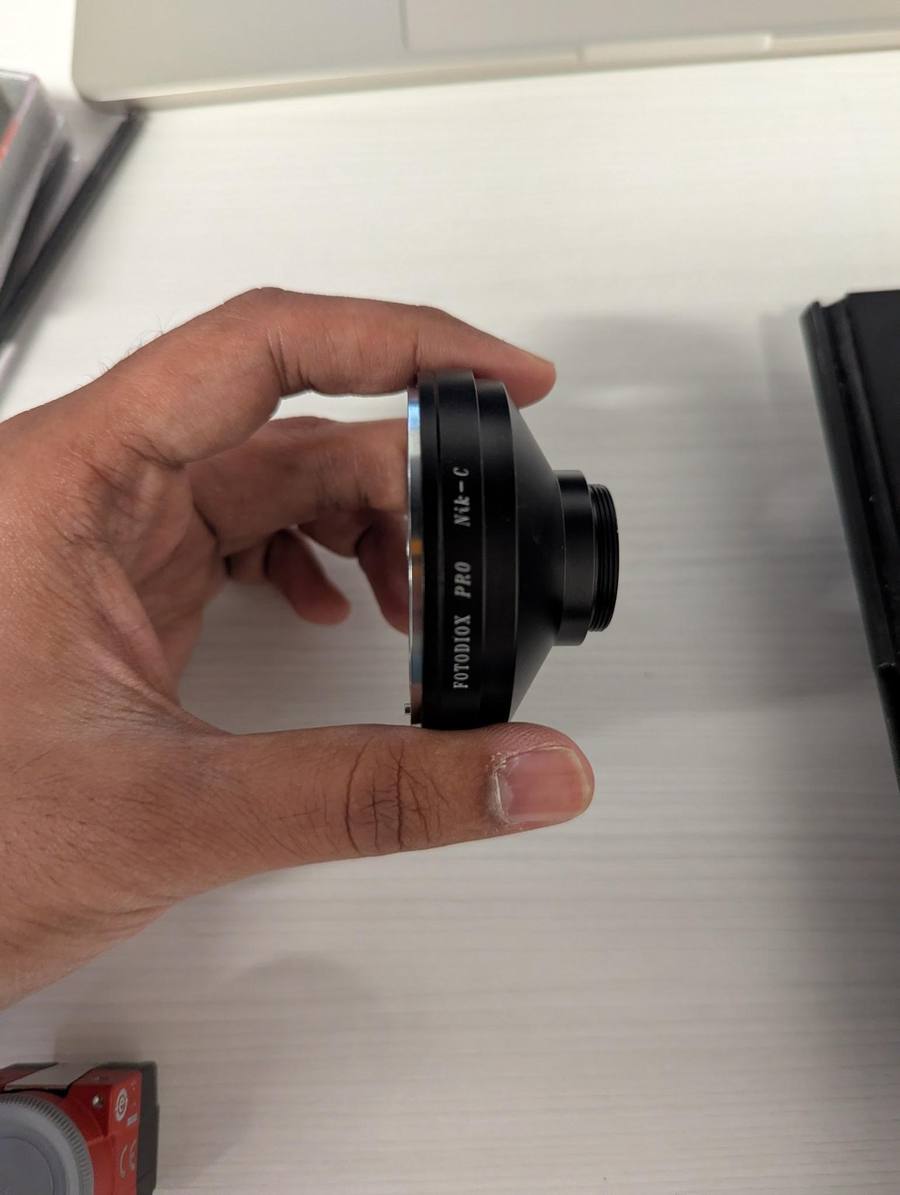 Screwing camera onto adapter