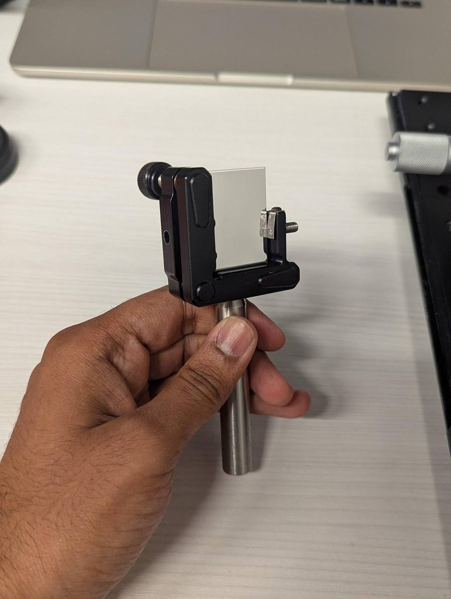 Rectangular mirror post in hand