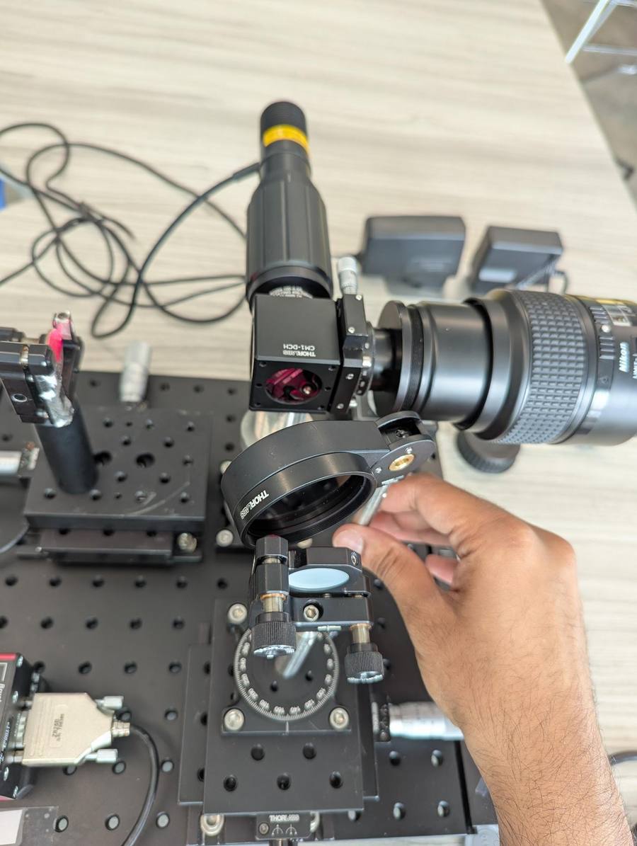 ND filter inserted at an angle in the light path